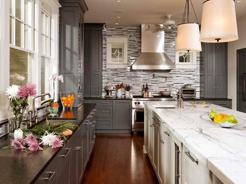 grey kitchen cabinet with accent wall