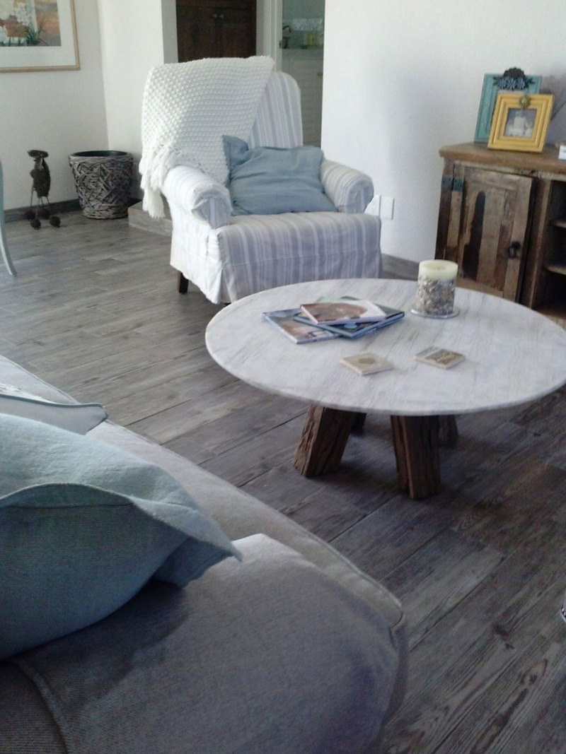 gray hardwood floor idea plus traditional upholstered chair