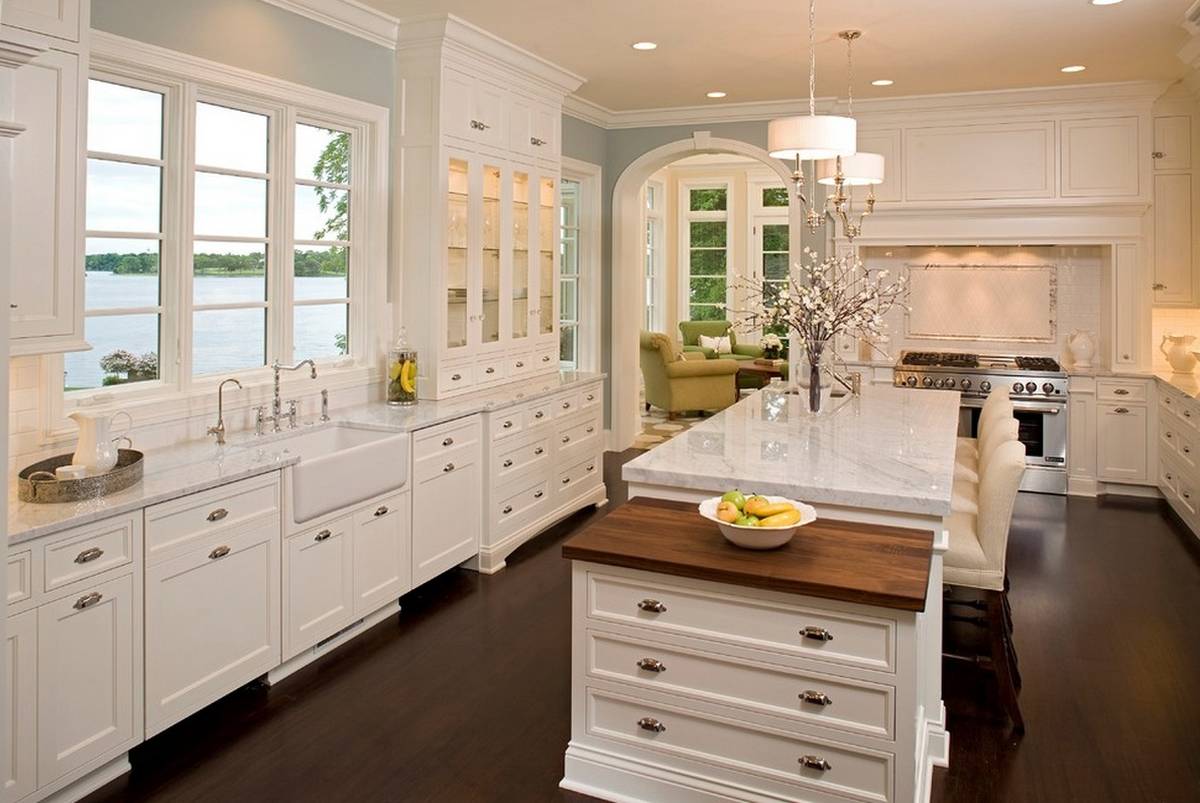 large kitchen with white cabinet and painted wall
