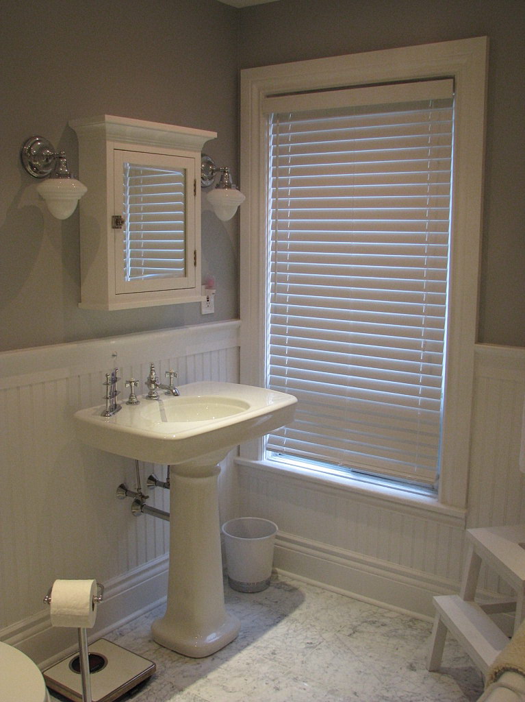 How to Cover Dated Bathroom Tile with Wainscoting