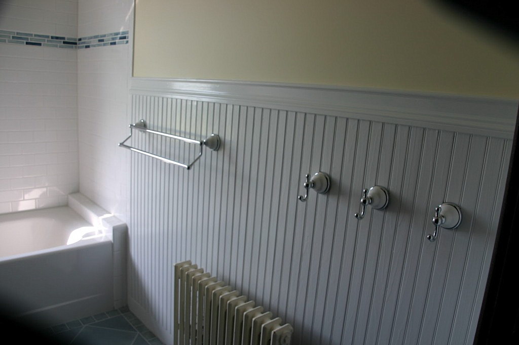 How to Cover Dated Bathroom Tile with Wainscoting