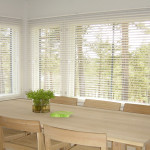 Corner White wooden venetian blinds