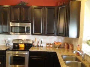 Wonderful Espresso Kitchen Cabinet over Brown Marble Counter Top