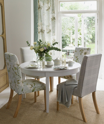 Dining room decorated with floral fabric
