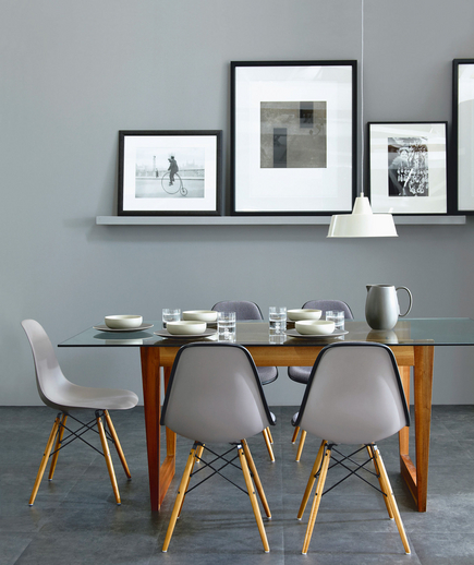 Grey photo ledge in a grey dining room