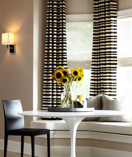 Table for One: Small dining table, window seat and horizontal stripe curtains Small dining table, window seat and horizontal stripe curtains