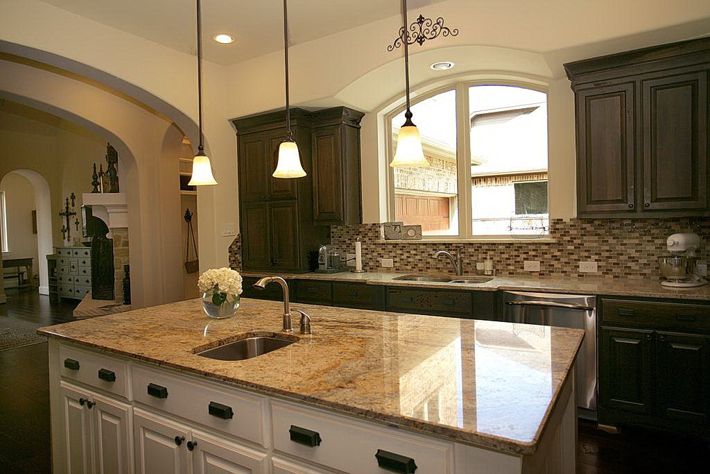 Stainless steel utility sink in kitchen design ideas.