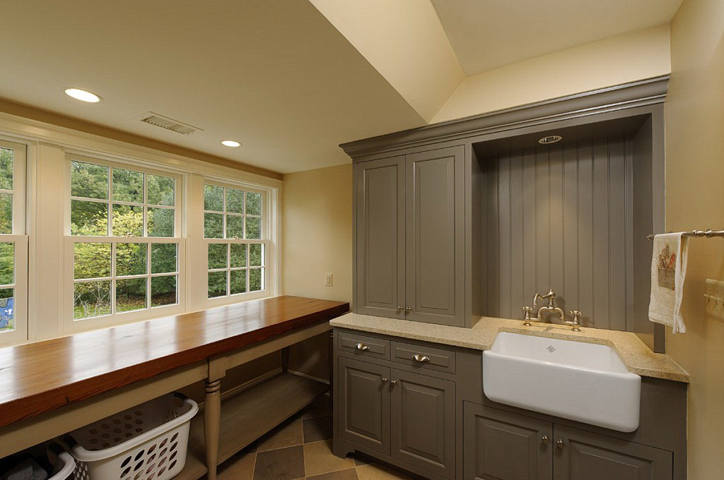 http://www.gloanna.com/img/2014/8/winsome-laundry-room-features-reclaimed-pine-timbers-custom-cabinetry-and-farm-house-utility-sink-in-potomac-md.jpg