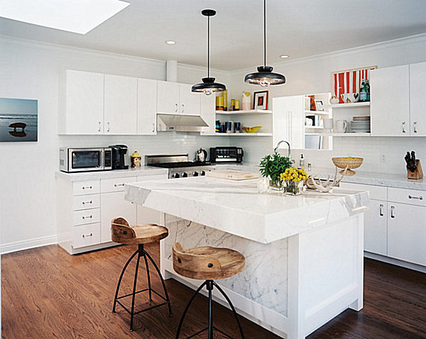 White marble island with wooden bar stools