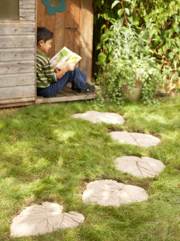 Concrete Leaf Stepping Stones Lead to Playhouse