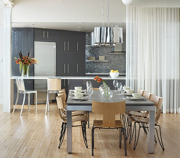 Loft dining room with shiny pendant lights