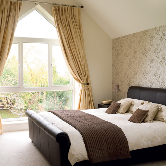 attic bedroom design with big window