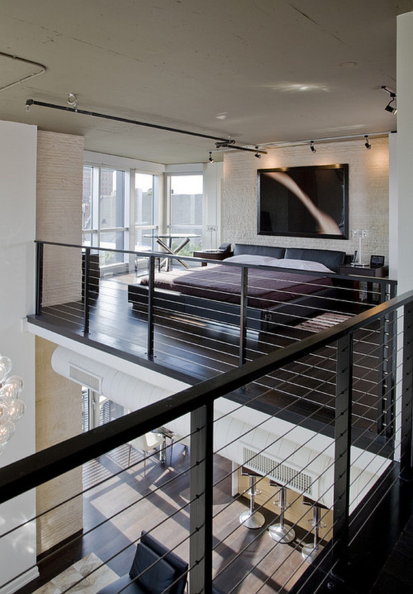 Fancy Bedroom Area Is Open To The Atrium by FORMA Design. Fancy Inspirational Bedroom Area With Black Floors Is Open To The Atrium by FORMA Design.
