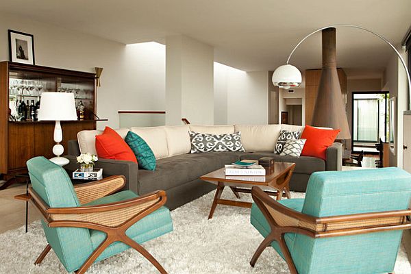An Amazing Living Room Set In Blue Aquamarine And Orange As Bold Colors by Chris Barrett Design.