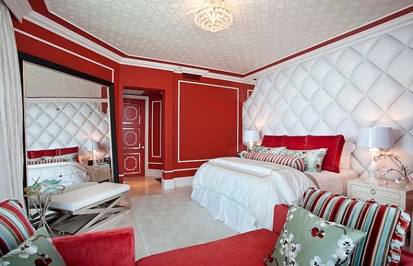 Hollywood inspired bedroom decor in white and red with rich textiles such as velvets and silks.