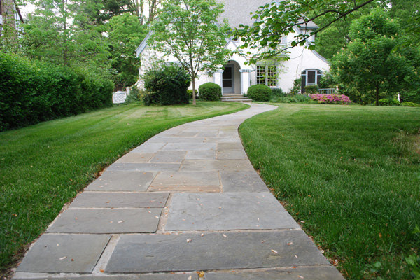 Stone walkway to suburban home