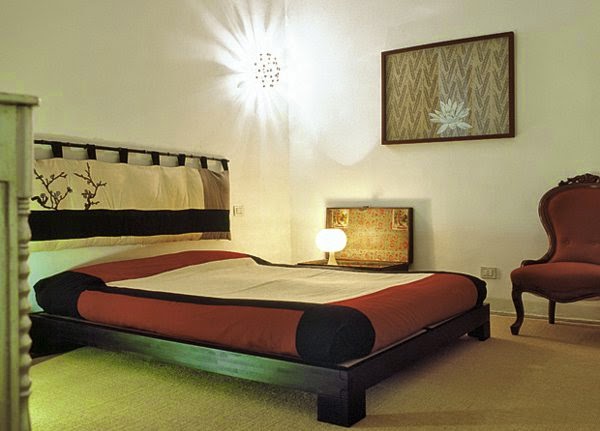 modern bedroom lighting ideas: bedroom with wall lamp likes the sun wall lighting fixtures