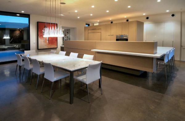 Sleek lineup of the Fucsia pendant lights above the dining area Sleek lineup of the Fucsia pendant lights above the dining area