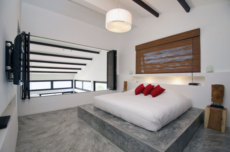 Modern Bedroom Conrete Floor with Red Pillow Ideas