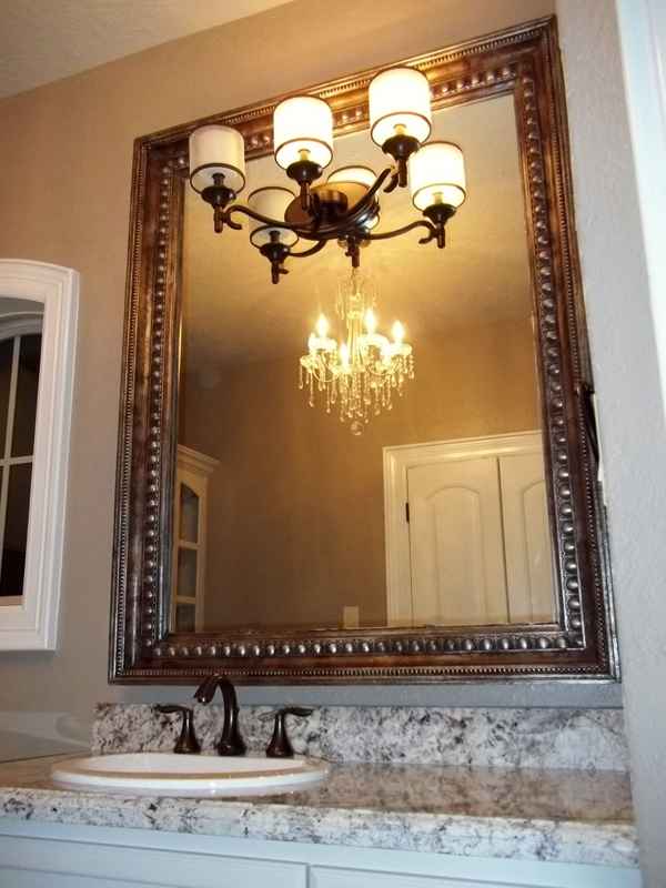 framing a bathroom mirror with crown molding