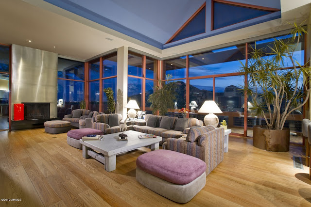 Living room with large floor to ceiling windows