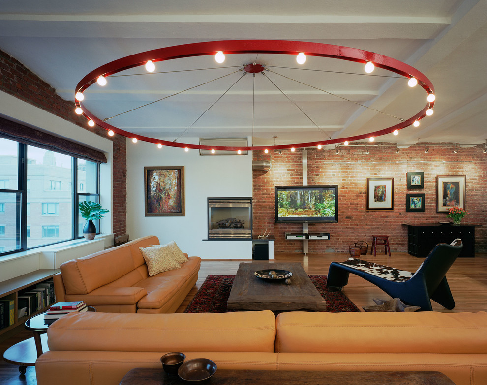 living room lighting idea with industrial style elements and sofas which looks very modern
