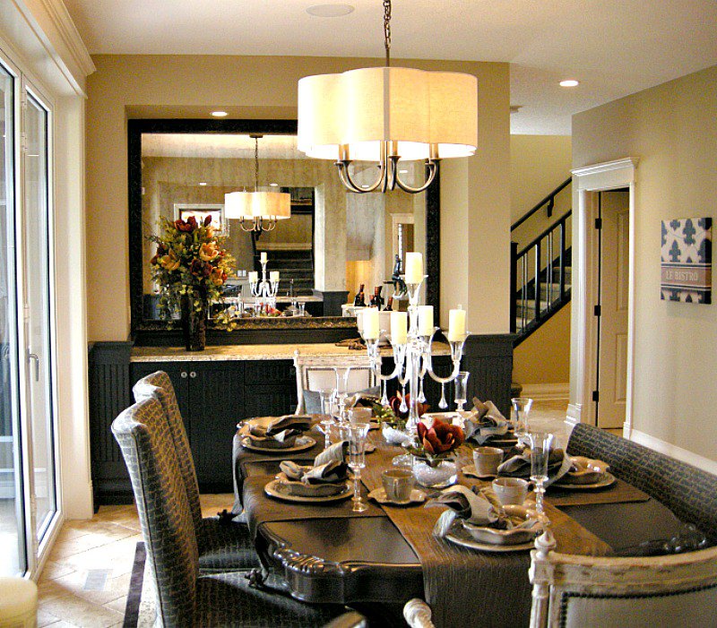 dining room with mirrors