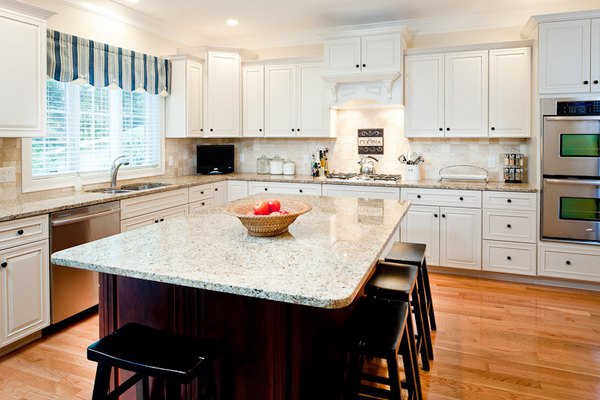 new venetian gold granite white cabinets dark island bar stools wood flooring new venetian gold granite white cabinets dark island bar stools