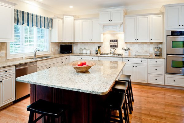 new venetian gold granite white cabinets dark island bar stools