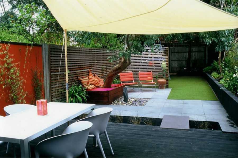 best place to relax in garden home with outdoor bed and swing equipped outdoor dining