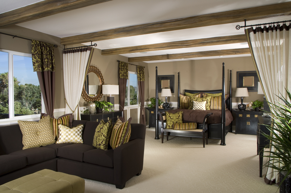 Large bedroom with integrated color scheme of earth tones Large bedroom with integrated color scheme of earth tones