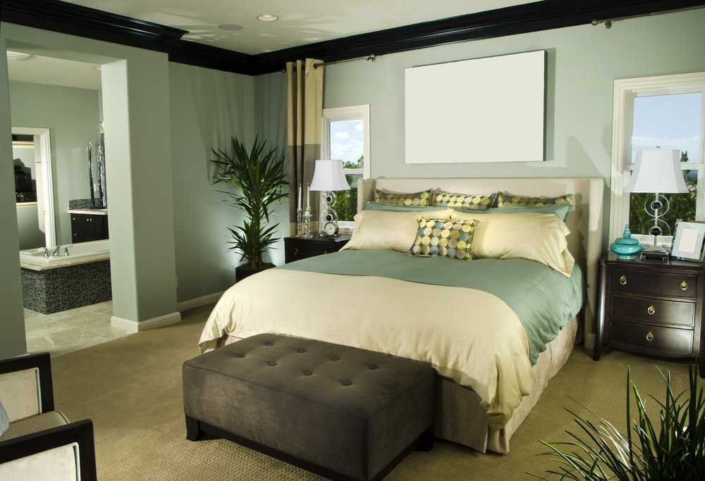 Small master bedroom in green, cream and brown color design