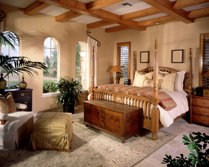 Moderately sized master bedroom in Southwest design