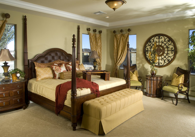 Contemporary Southwest design in this room starts with the large four-poster bed