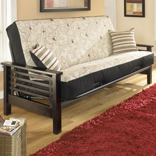 futon sofa with wooden frame in dark brown color and white upholstery fabric