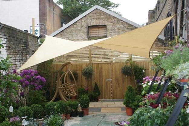 Long-term solution for sunshade, beautiful wooden structure and stone patio ideas