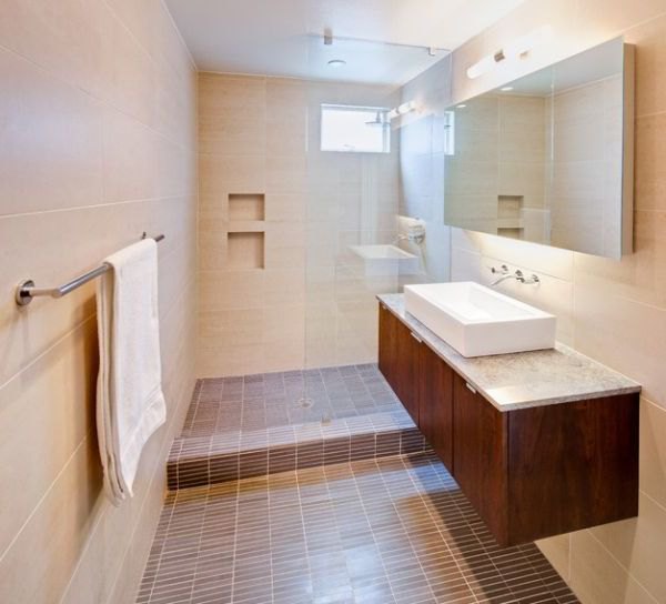 Sleek Floating Sink Cabinet next to a walk in shower