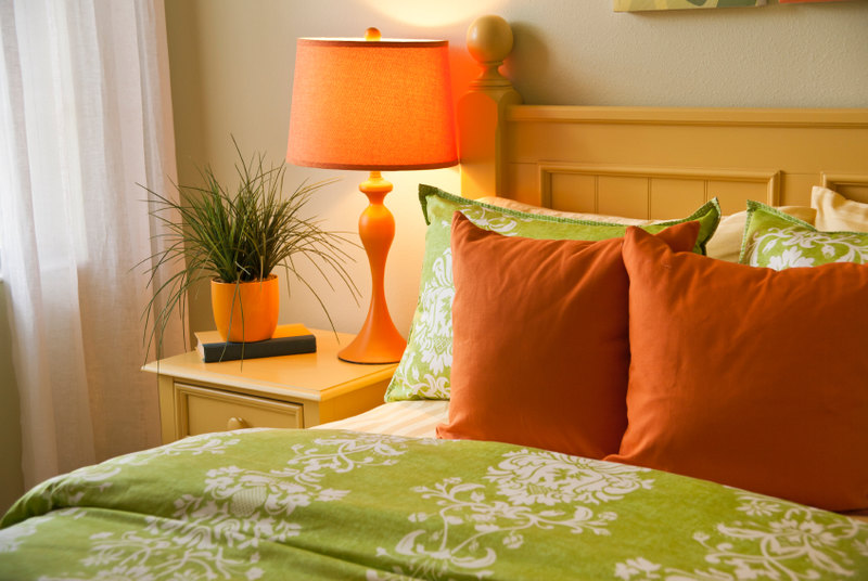 Orange and greens play perfectly against each other in this fun and bold arrangement.