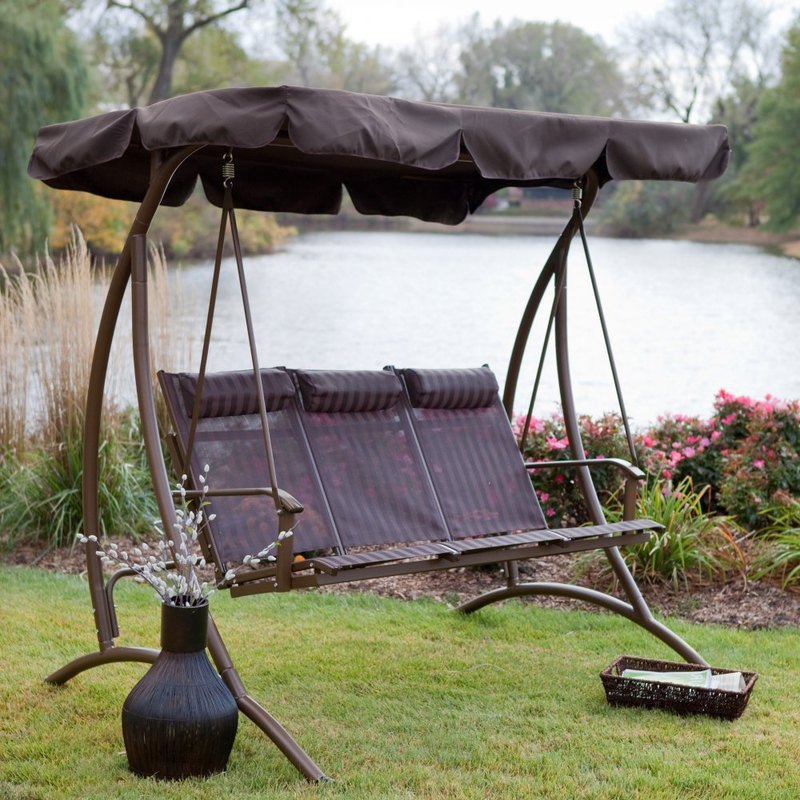 Featuring Patio Swing Set With Canopy On Lawn Grass Near Pond And Small Garden