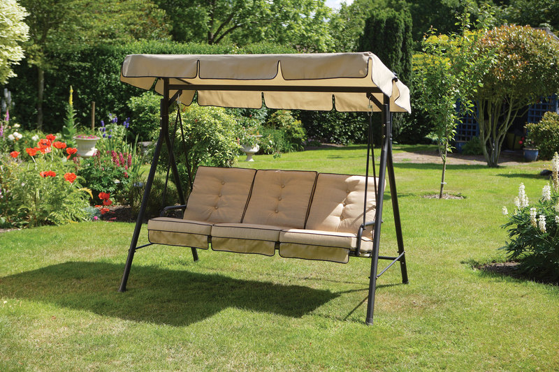 Featuring Patio Swing Set With Canopy On Lawn Grass At Backyard Plus Gardening Ideas