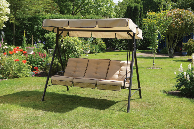 Featuring Patio Swing Set With Canopy On Lawn Grass At Backyard Plus Gardening Ideas