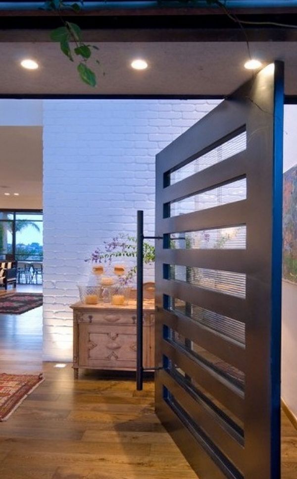 An elegant wooden pivot door
