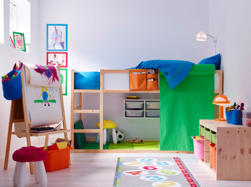 A colourful children's room with a loft bed in solid pine with space underneath for drawing