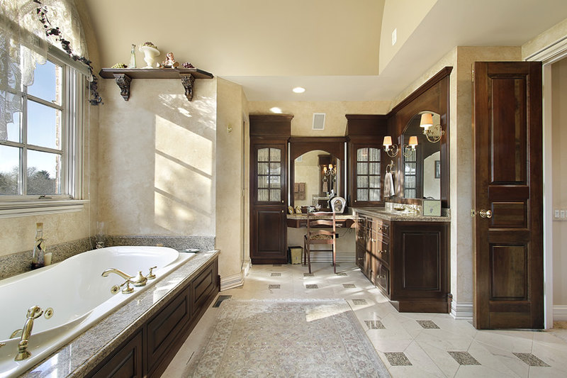  Cozy bathroom design with classical design elements using marble porcelain tiles with smaller pieces of granite tiles