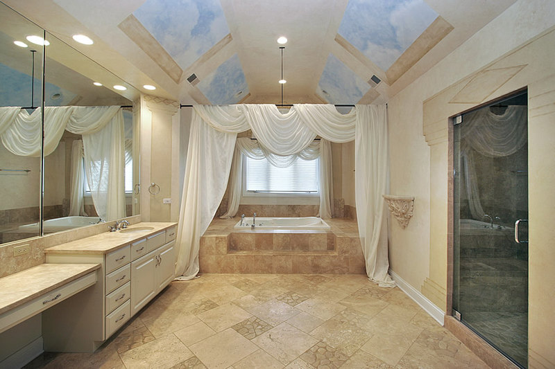 Bathroom uses mix-sized ceramic tiles for its floors, with accents of faux natural-cut stone tiles