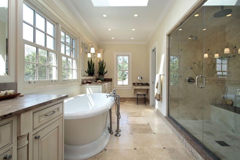 Country inspired bathroom design with pedestal tub and large rainfall shower Country inspired bathroom design with pedestal tub and large rainfall shower