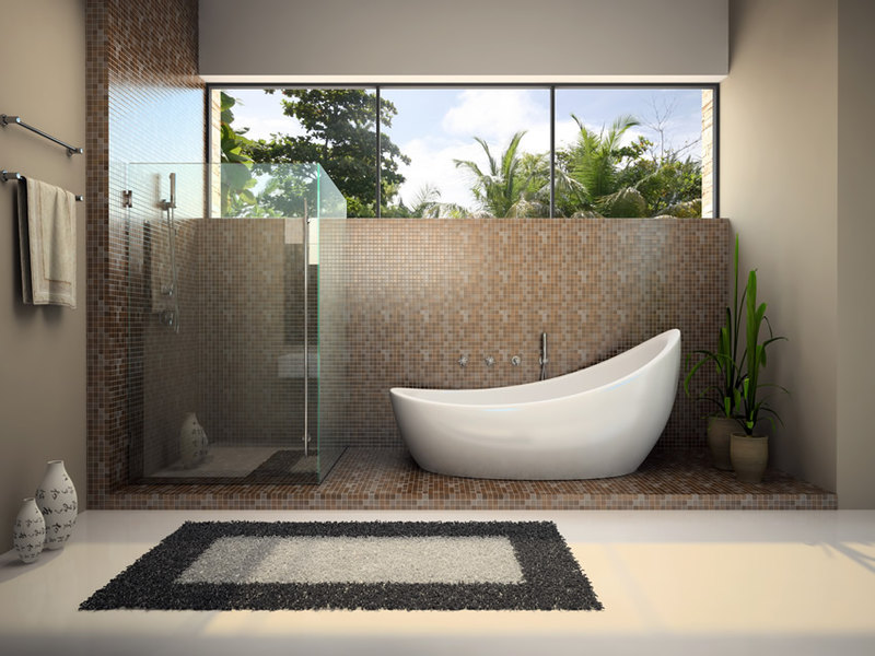 Modern bathroom design with large plain white porcelain tiles and sloped bath tub Modern bathroom design with large plain white porcelain tiles and sloped bath tub