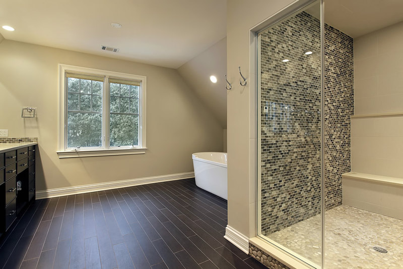 Large bathroom uses a combination of natural and man-made materials