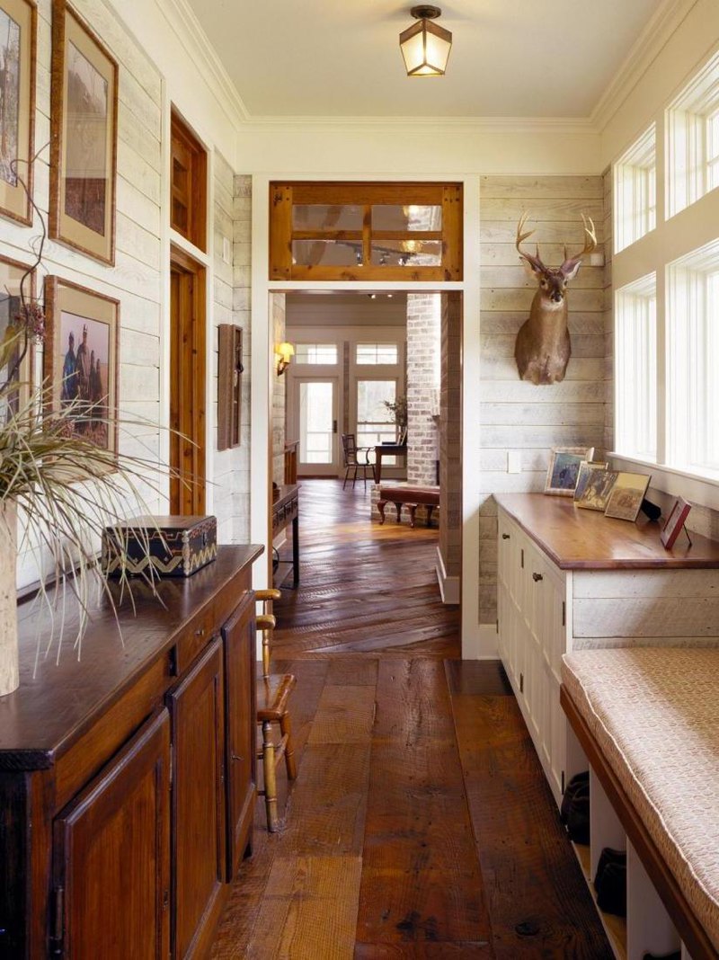 Bright narrow hallway with wooden drawers and shoe storage bench also lovely lamp and windows ideas