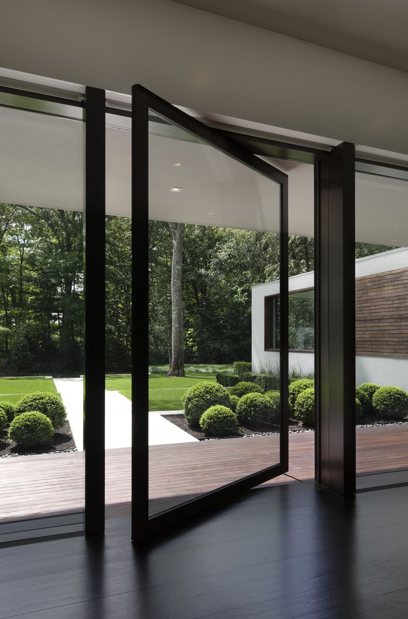 New Canaan Residence Pivot Front Entry Doors